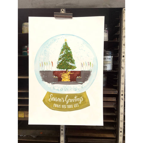RHO-9121 Rockefeller Center Snowglobe - Season's Greetings